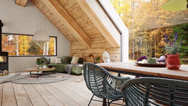 Casa din padure, o combinatie intre o cabana rustica din lemn si o casa moderna cu pereti din sticla
