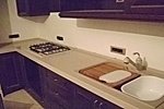 PACIFIC-BLAT DE BUCATARIE CU PLINTA SI CHIUVETE DIN CORIAN - PACIFIC-BLAT DE BUCATARIE CU PLINTA SI CHIUVETE DIN CORIAN